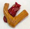 BP274 burgundy bakelite owl on wood tree limb